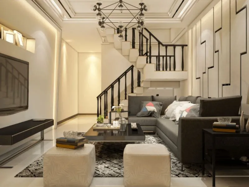 Duplex home living room with inside staircase and railing